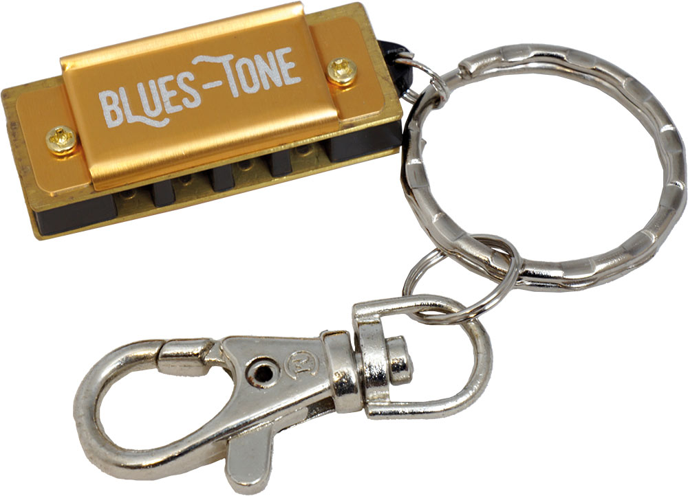 Blues Tone Mini Harmonica in C. 4 Hole 8 notes. Black cover. Comes with a key ring and clip